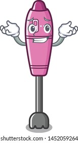 Grinning immersion blender placed in character box