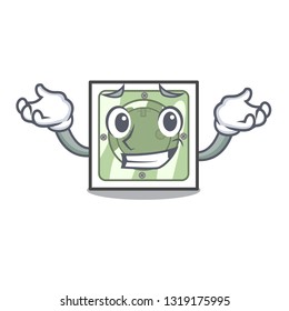 Grinning power socket attached the mascot wall