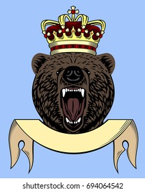 A grinning terrible bear in a golden crown against the background of a banner 