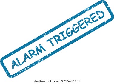 Un sello de goma azul arenoso que indica claramente la frase crítica 'Alarma activada' en mayúsculas en una superficie blanca limpia.