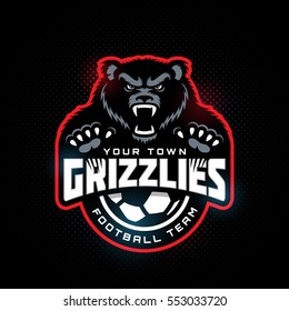 Grizzly bear mascot for a soccer team on a dark background. Vector illustration.