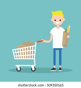 Grocery shopping concept: Young customer standing with a trolley and holding a shopping bag / flat editable vector illustration