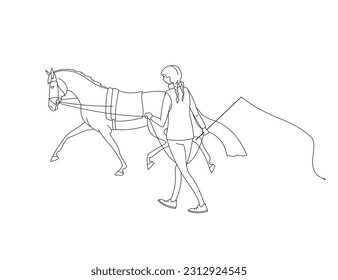 Groom moves the horse on the longe
