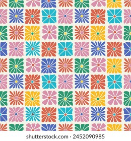 Groovy colorful floral seamless pattern. Checkered background with daisy flowers. Modern trendy retro hippie 60s 70s style. Surface cover design. Fabric textile print.