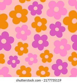 Groovy Daisy Flowers Seamless Pattern. Floral Vector Background in 1970s Hippie Retro Style for Print on Textile, Wrapping Paper, Web Design and Social Media. Pink and Orange Colors.