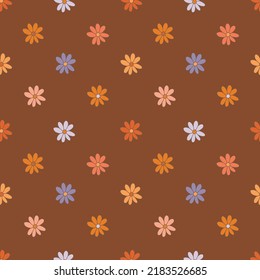 Groovy daisy flowers seamless pattern, 60s, 70s retro style. Rainbow daisies on a brown background. Pink, orange, purple and red colors.