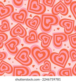 Groovy hearts seamless pattern. Trendy romantic vector background in 1970s-1980s. Hippie retro style for print on textile, wrapping paper, web design and social Media. Red and pink colors.