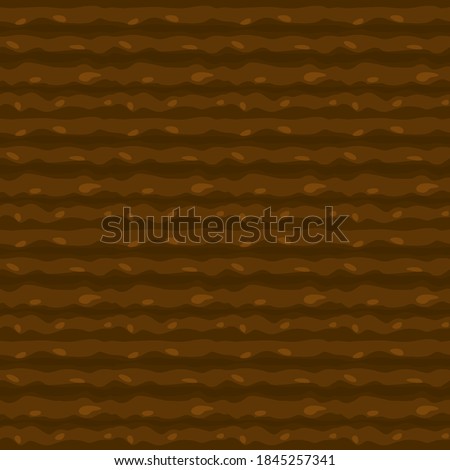 Ground seamless texture. Game UI for the game farm. Brown background of cultivated land.