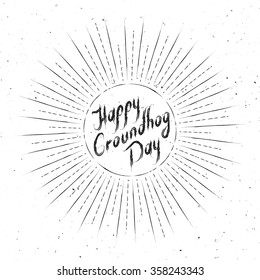 Groundhog Day greeting card. Hand-written lettering on vintage grunge background. Groundhog Day emblem in a retro style.