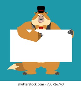 Groundhog day. Groundhog in hat holding banner blank. Woodchuck and white blank. Marmot thumb up and winks joyful emotion. place for text.  Vector illustration