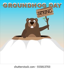 Groundhog shows a tablet with an inscription spring peeping out of a hole. Groundhog Day