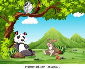 Group of animals relaxing under a tree 