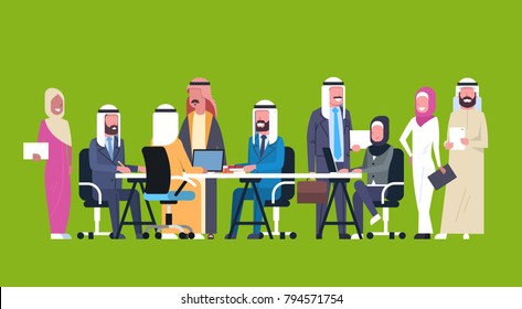 Group Of Arabic Business People Working Together Sit At Office Desk Muslim Workers Team Brainstorming Meeting Flat Vector Illustration