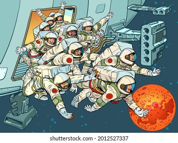 A group of astronauts runs out of a spaceship to Mars