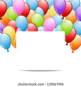a group of balloons and a sheet of paper