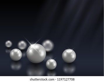 Group of beautiful vector shining pearls on dark blue background with blurred light beams - luxury, beauty concept