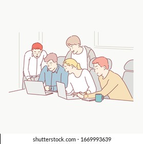Group of business people analyzing and discussing during a working meeting in a modern office. Hand drawn style vector design illustrations.