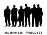 Group of business people in winter coats and jackets at a meeting