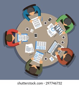 Group Of Business People Working At Round Office Table, Top View