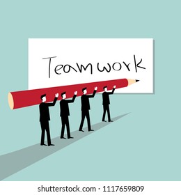 Group of businessman helping to write word teamwork