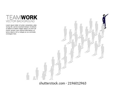 Group of businessman standing and point ahead from team shape arrow. business concept for company mission and teamwork.