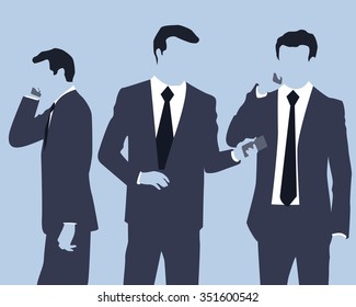 Group of businessmen walking, talking on the phone