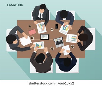 Group of businessmen working at the table Top view