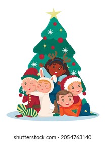 a group of children posing near the Christmas tree in costumes of elf, deer, hare, rabbit and santa claus. poster, banner, christmas party, new years eve.