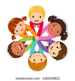 Group of children putting hands together on white background