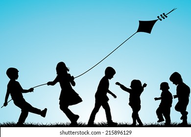 Group of children silhouettes with a kite outdoor