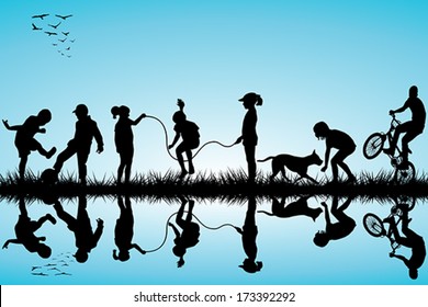 Group of children silhouettes playing