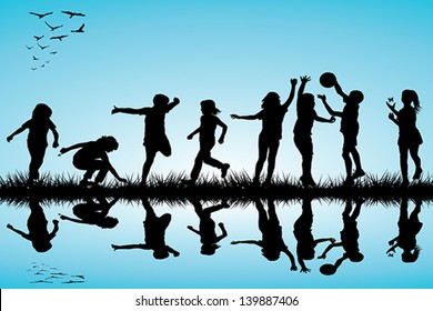 Group of children silhouettes playing outdoor