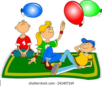 group of children sitting on the carpet and playing with balloons; 