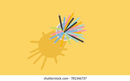 A group of color pencils inside a mug on yellow background with shadow.
