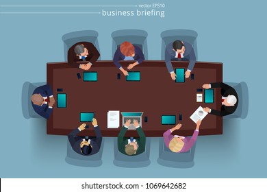 Group of company partners are meeting at the briefing table. Business conversation involving businessmen and businesswomen. Team of employees interact with their boss. Top view. Flat vector picture.