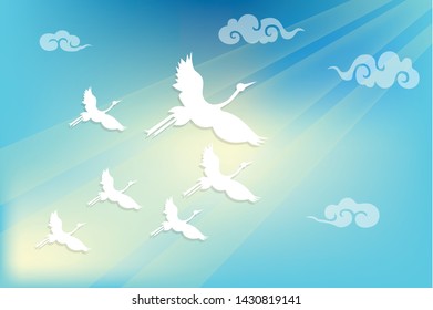 A group of crane bird is flying into the sky (heaven).