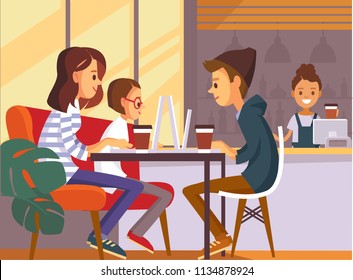Group of creative young people working together using laptops, sitting at the table in coffeehouse. Artist, designer, freelancer, student. Startup business.