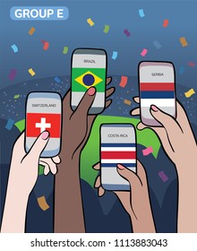 Group E of football (soccer) championship 2018. Multiracial people having fun watching the game. Hands holding smartphones with flags from Brazil, Switzerland, Serbia, Costa Rica. Mobile Apps concept