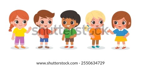 Group of elementary school children standing in the classroom and talking to each other.  Cute kids communicating with each other. Happy boys and girls meet and make friends at school.