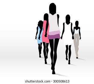 Group of fashion women walking on the runway