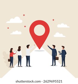 A group of five business people are standing on a road pointing to a large red location pin with a few clouds and starbursts around it.