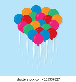 Group of floating balloons in multiple colors