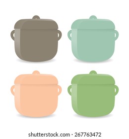Group of four pastel colored pots on the white background.