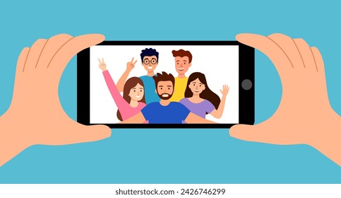 Grupo de amigos tomando una foto con un smartphone. Hacerse un selfie. Concepto de amistad.