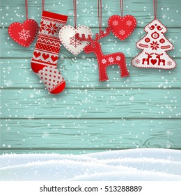 Group of hanging christmas decorations in scandinavian style in front of blue wooden wall, includes hearts, deer, tree and santa's stocking, vector illustration, eps 10 with transparency and gradient