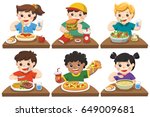 Group of Happy Kids eating delicious food on the dining table.