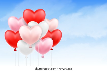 group of heart balloon floating in blue sky