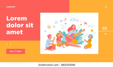 Group of kids clapping hands at their teacher playing guitar. Children enjoying music class outdoors. Can be used for daycare, education, musical school concepts