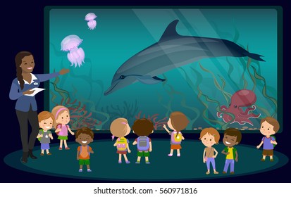 Group of kids oceanaruim aquarium excursion teacher. School or kindergarten students filed trip. Flat style vector illustration underwater and marine animals dolphin jellyfish octopus coral algae.