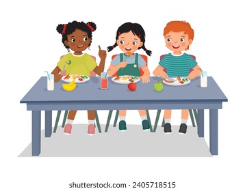 Grupo de niños estudiantes almorzando juntos en el comedor escolar